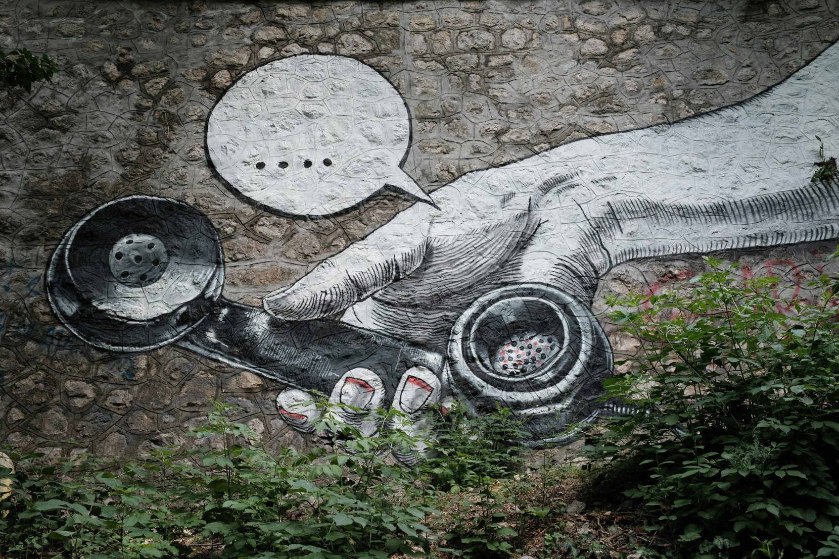 mural of hand with telephone
