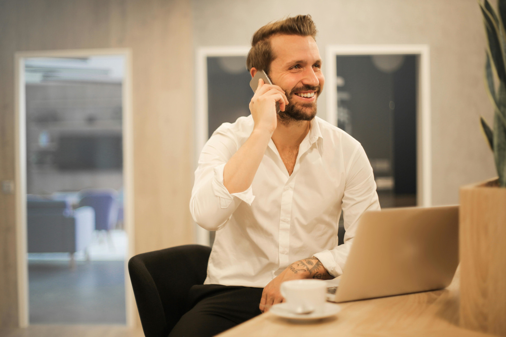 Smiling Man on Telephone