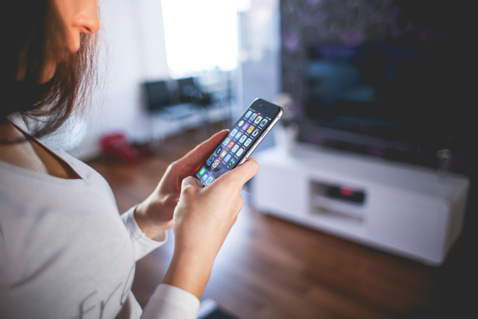 Woman setting divert on iphone